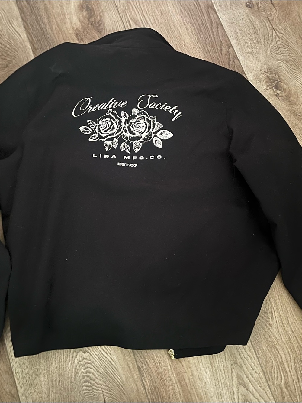 Lira Black Bomber Jacket with White Floral Back Print